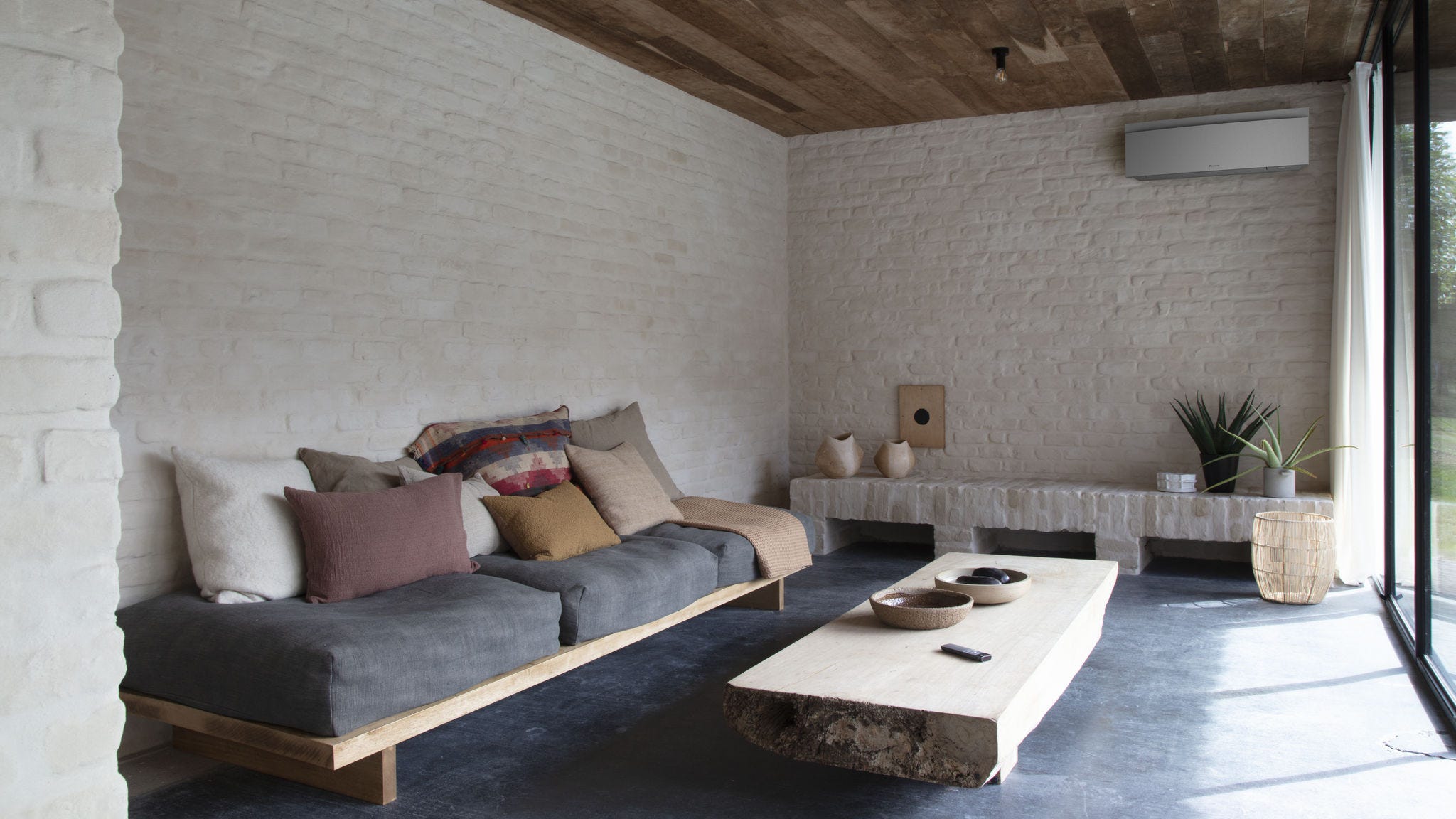 Casa climatizada por un aire acondicionado de pared