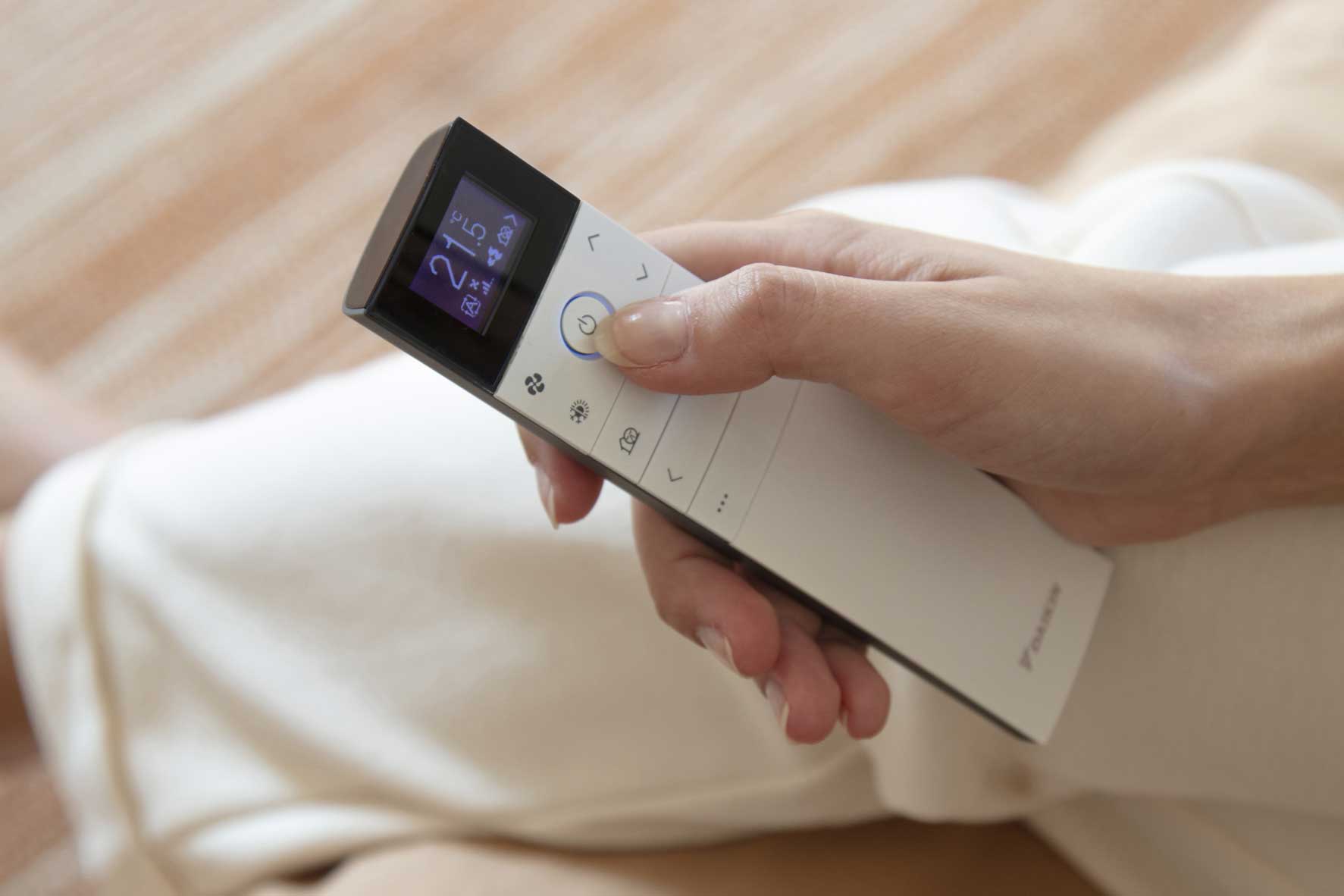 Mando para regular la temperatura