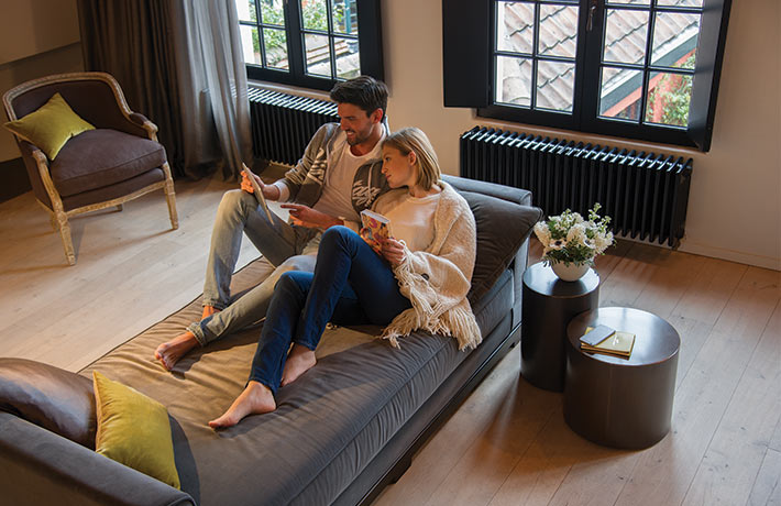 Couple reading on a couch.